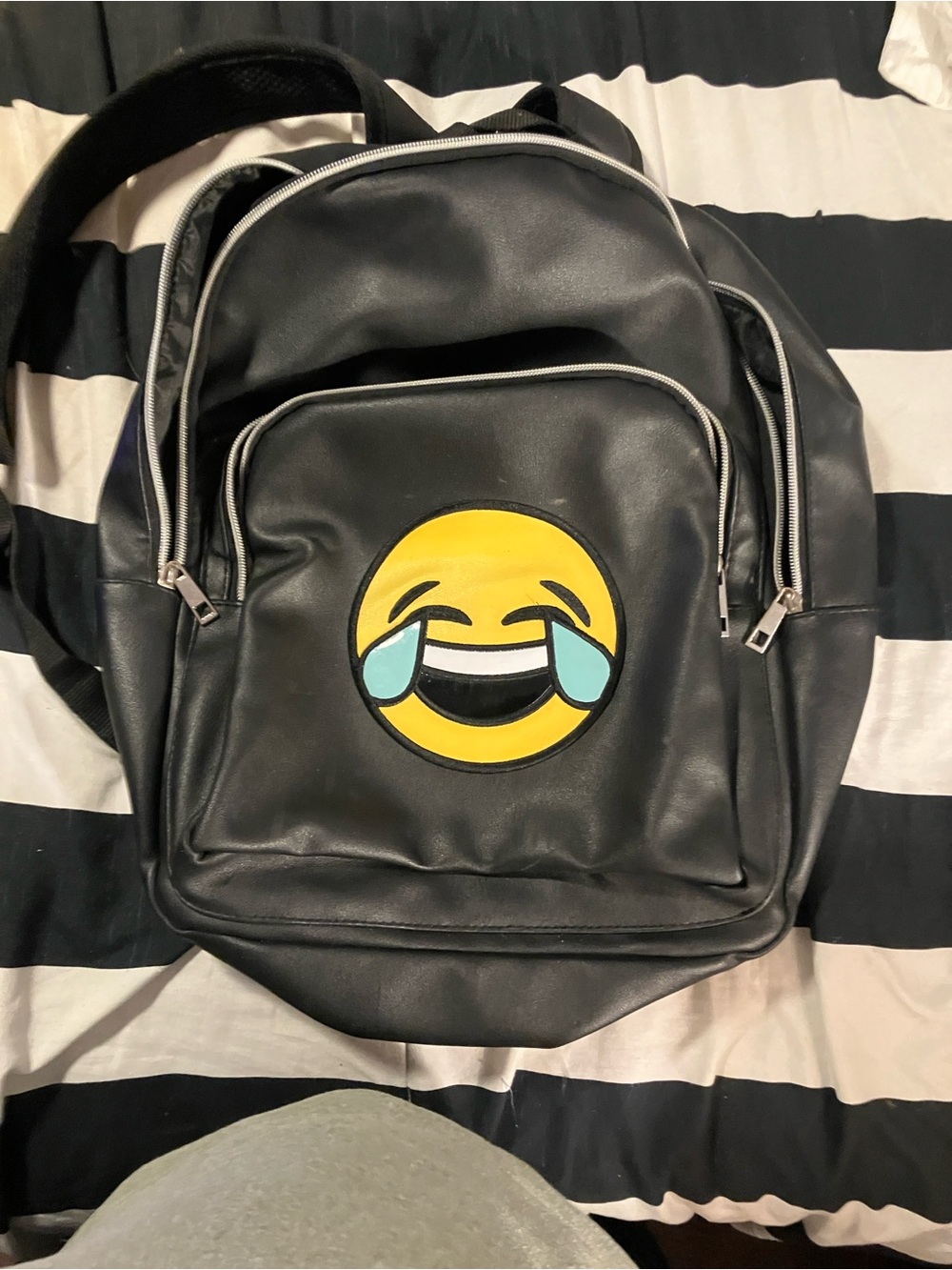 Olivia Miller faux black leather back pack , zipper closure, emoji graphic, m